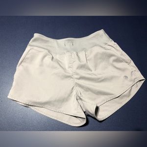 Tan athletic shorts